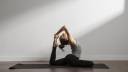 active-woman-practicing-yoga-home